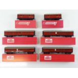 A group of HORNBY DUBLO OO gauge Super Detail bogie and six wheeled passenger brake vans in BR