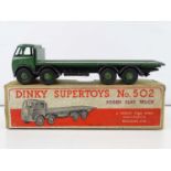 A DINKY 502 Foden Flat Truck, 1st style cab in green/black chassis/green hubs - G in G box