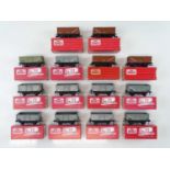 A group of HORNBY DUBLO OO gauge mineral wagons in various styles, some in Tony Cooper repro boxes -