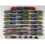 A group of unboxed OO Gauge HST power cars, class 91 loco/DVT and a class 90, some a/f in various