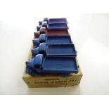 A DINKY 30J Austin Wagon trade box complete with 6 examples of the model, 5 in blue and 1 in