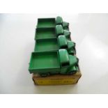 A DINKY 25W Bedford Truck trade box complete with 4 examples of the model in green - G with G