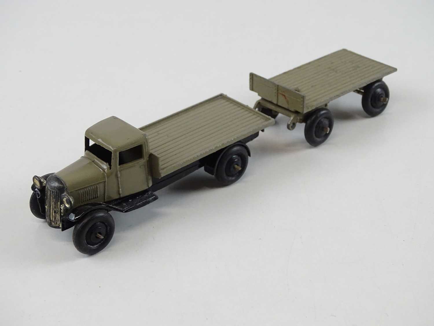 A DINKY 25T Flat Truck & Trailer trade box complete with 3 examples of the model, 2 in green, 1 in - Image 9 of 9