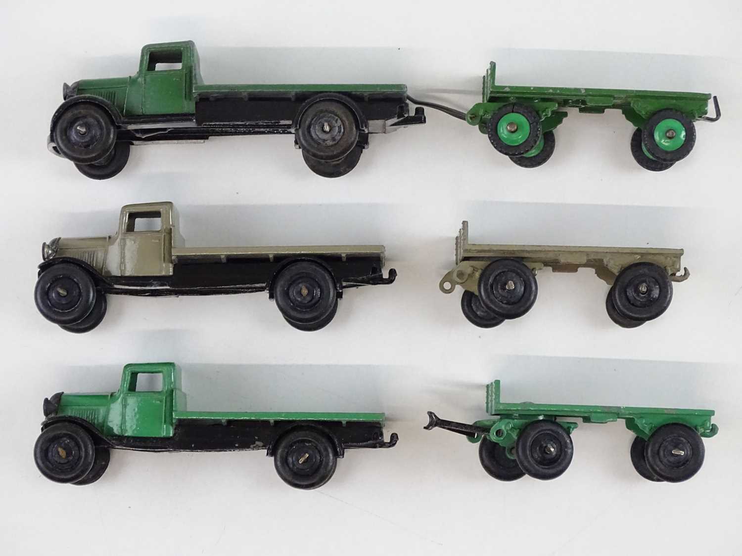 A DINKY 25T Flat Truck & Trailer trade box complete with 3 examples of the model, 2 in green, 1 in - Image 6 of 9