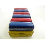 A DINKY 29H Duple Roadmaster Coach trade box complete with 6 examples of the model, 3 in blue and