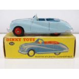 A DINKY 106 Austin Atlantic Convertible in light blue, unusually with a blue interior and red hubs -