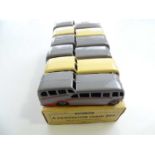 A DINKY 29F Observation Coach trade box complete with 6 examples of the model, 2 in cream and 4 in