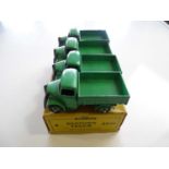 A DINKY 25W Bedford Truck trade box complete with 4 examples of the model in green - G with G
