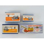 A group of DINKY construction vehicles comprising a 561 Blaw Knox Bulldozer, a 563 Heavy Tractor,