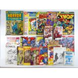 A mixed collection of MARVEL TREASURY and comic related books and magazines to include MARVEL