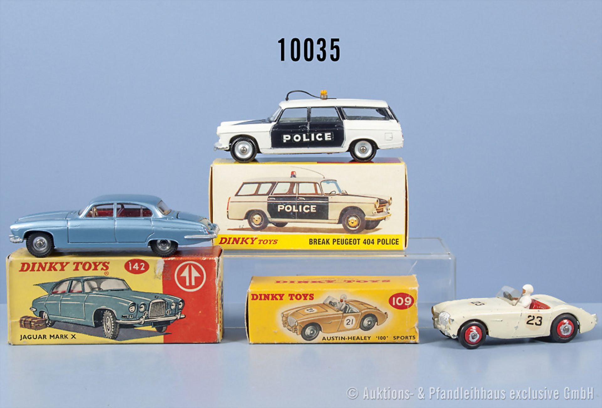 Konv. 3 Dinky Toys Fahrzeuge, dabei 109 Austin Healey, 142 Jaguar Mark X (Koffer fehlt) ...