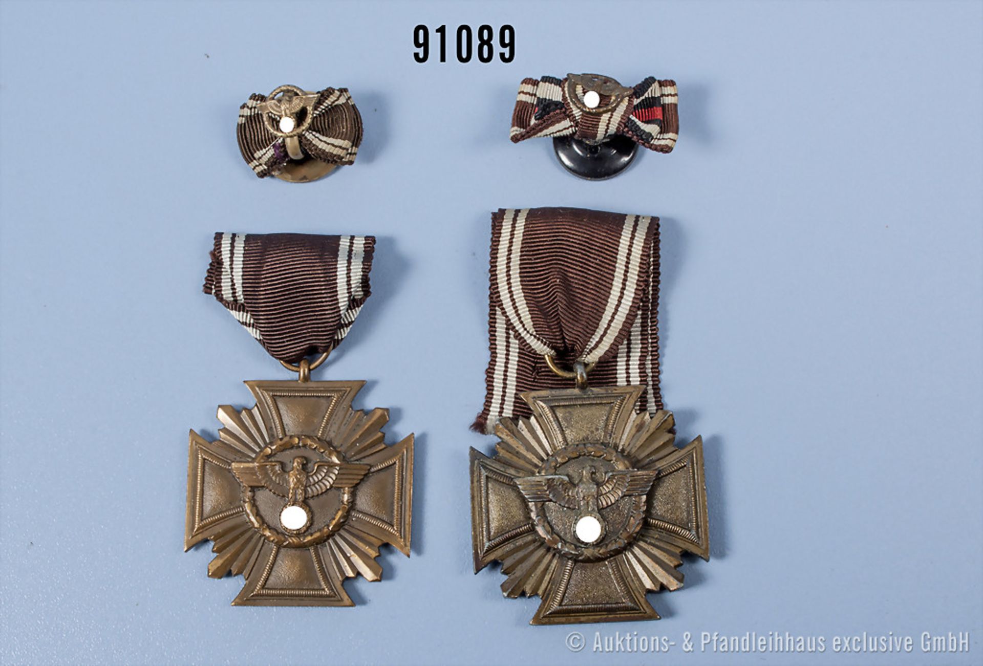 Konvolut 2 NSDAP Dienstauszeichnungen in Bronze, Buntmetall- und Zinkausführung mit 2 ...