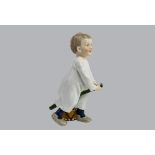 Porzellan Hentschel Kind, Meissen, um 1905, "Stehendes Kind, auf einem Stecken reitend, ...