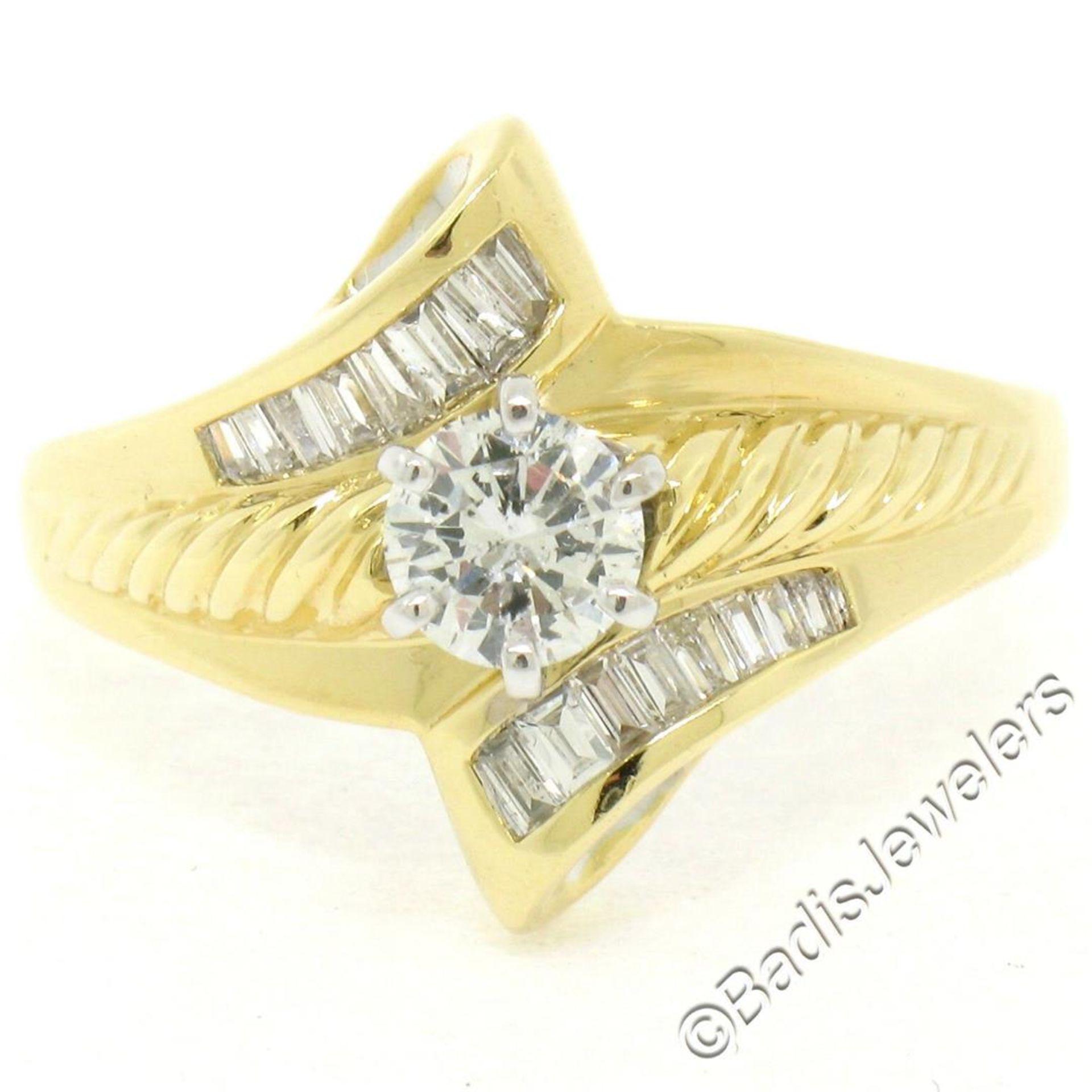 18kt Yellow and White Gold 0.90ctw Round and Baguette Diamond Ring
