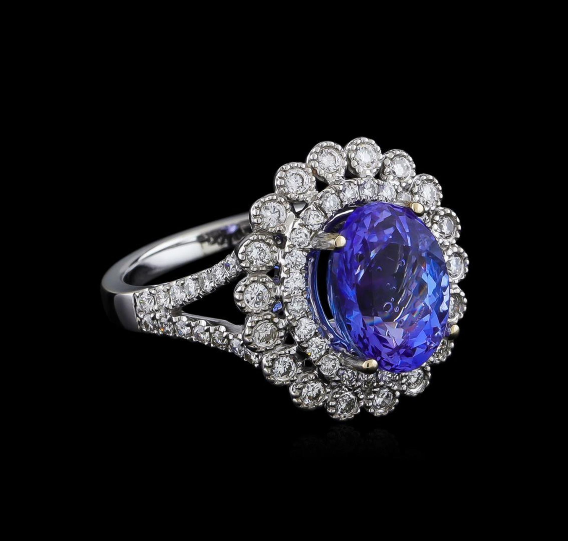 18KT White Gold 3.95 ctw Tanzanite and Diamond Ring