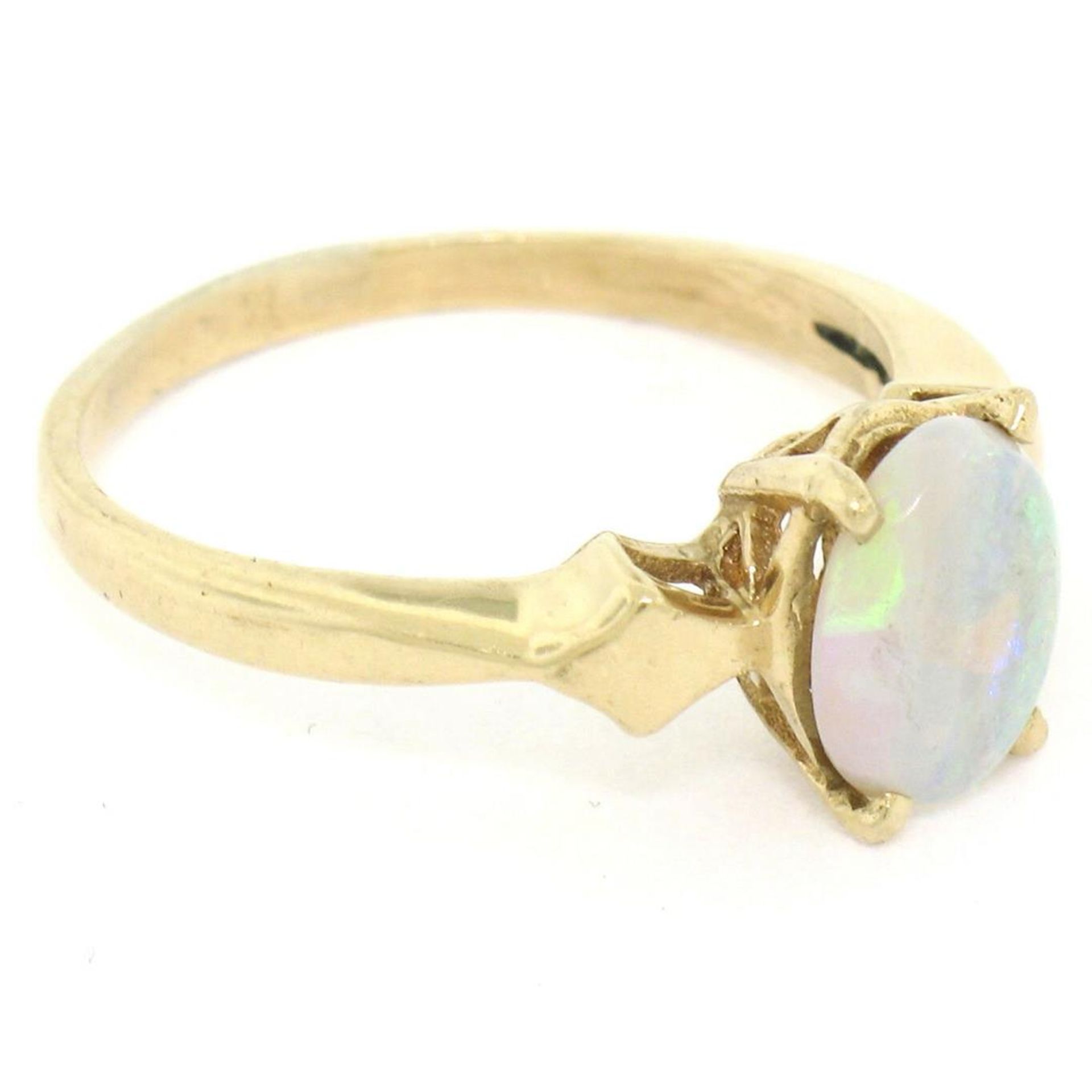 Vintage 14K Yellow Gold 0.65ct Petite Oval Cabochon Opal Solitaire Ring Size 6 - Image 4 of 9