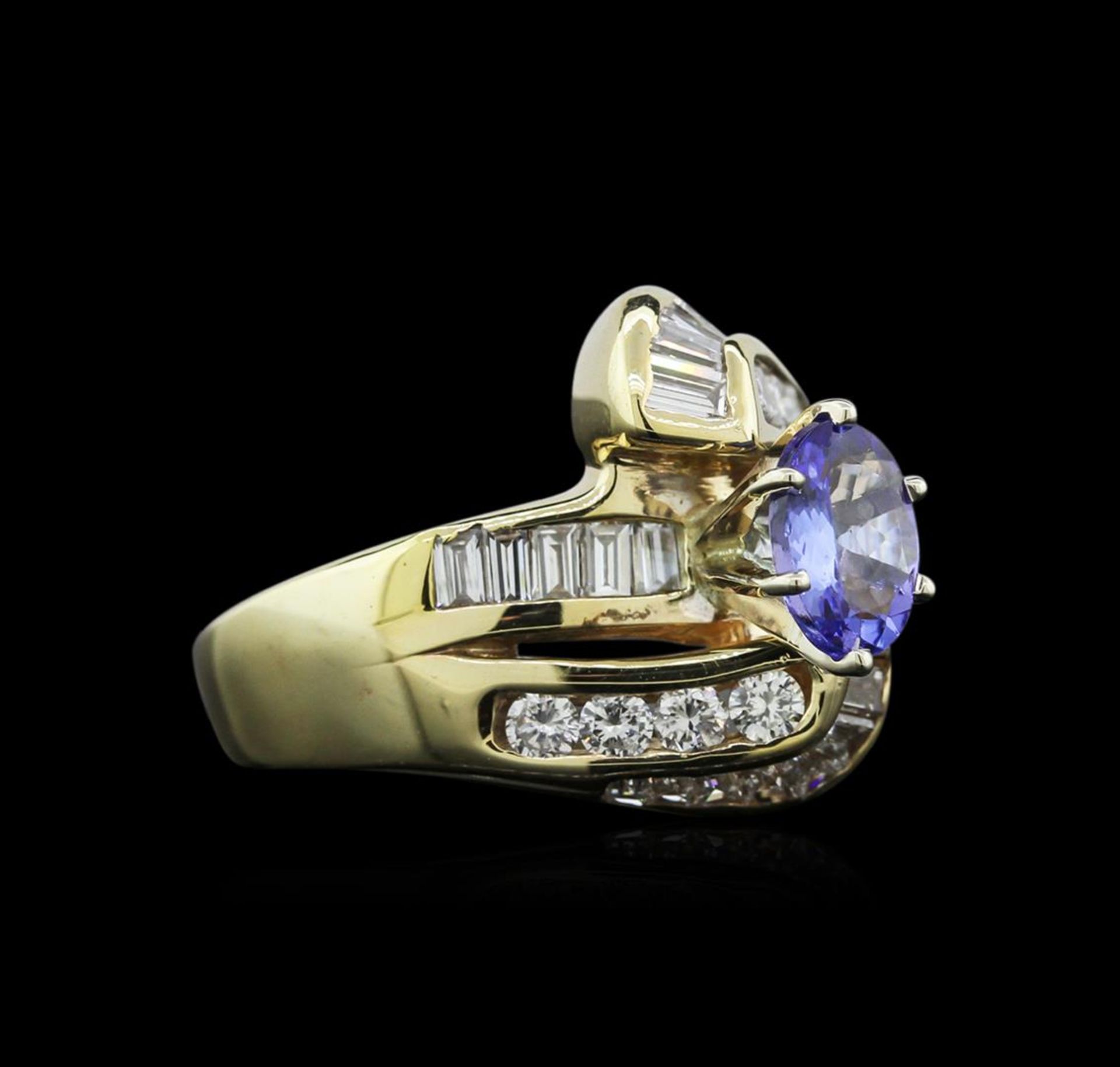 0.80 ct Tanzanite and Diamond Ring - 14KT Yellow Gold