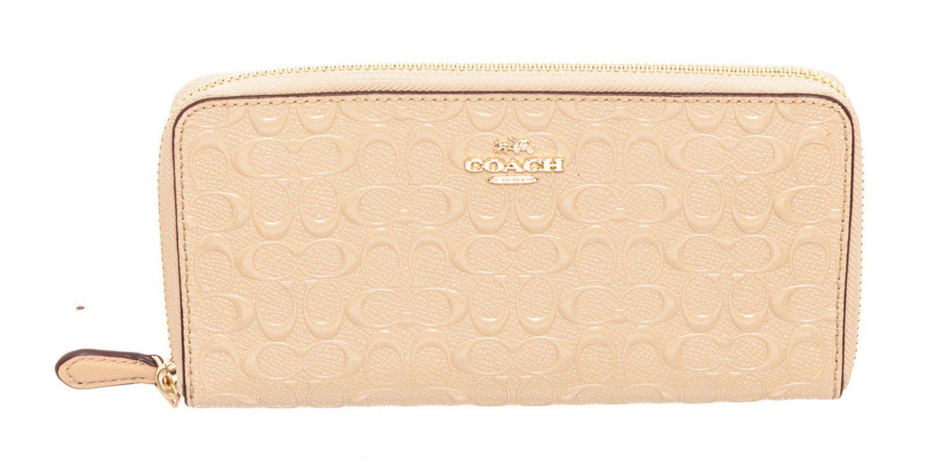 Coach Beige Debossed Logo Leather Zippy Wallet