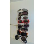 11 Pairs of vintage sunglasses and 7 cases