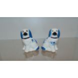 Pair of early staffordshire dogs in Blue and White .
