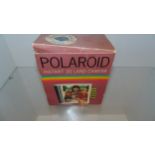 Unused polaroid camera in original box