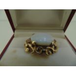 9ct gold brooch with oval white Iridescent opal 12 grams total weight