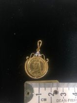 22ct Gold Fantasy jewellery queen Victoria coin with George and the dragon to rear set in a 9ct Gold