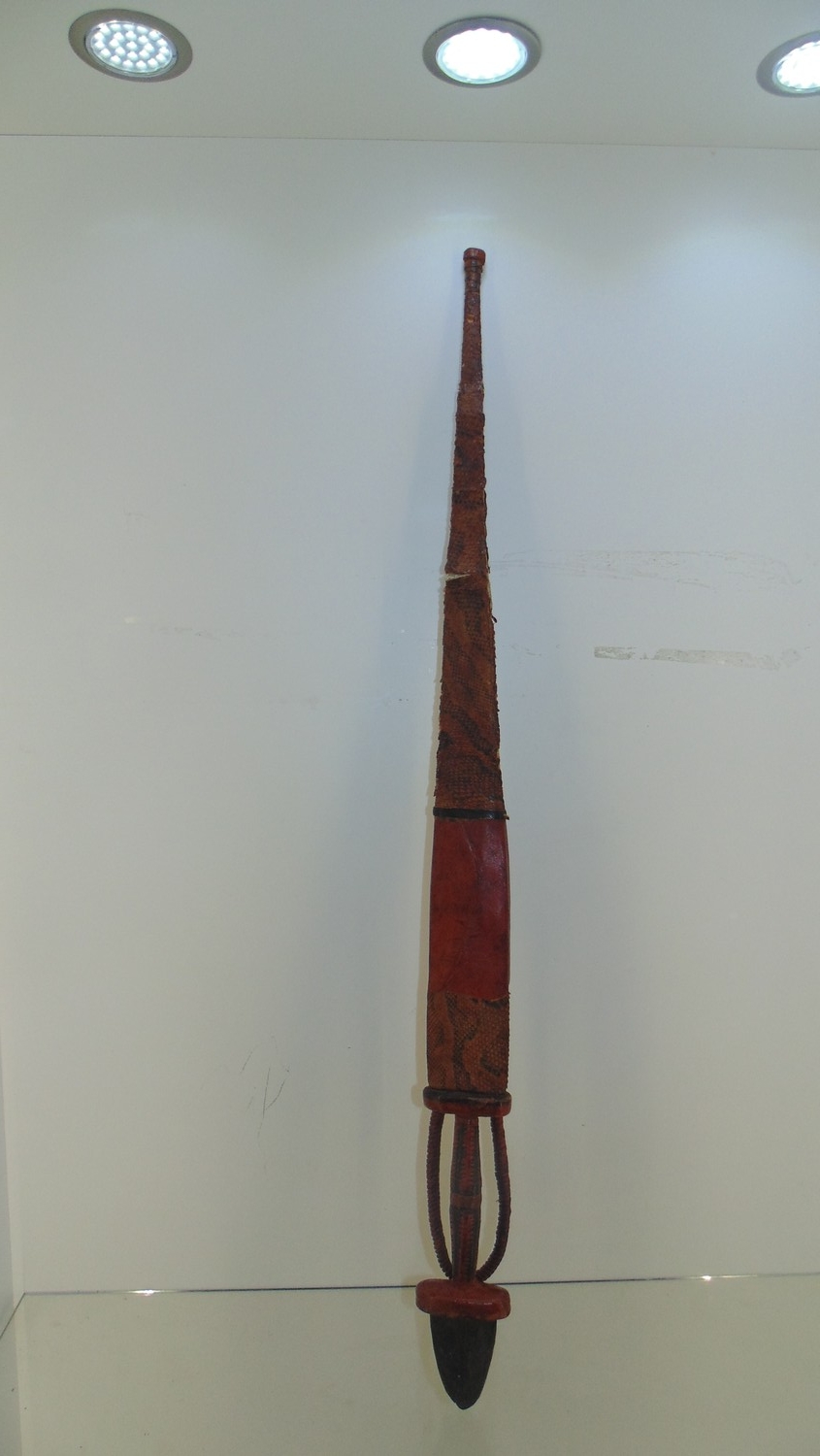African tribal sword , with animal skin sheaf 75cm.