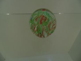Glass green and red paperweight