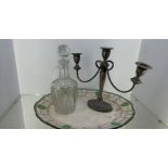 whisky and gin decanters and brass candle arbours and vases