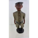 carved wood african soldier uniform