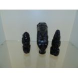 3 ornaments made from black stone