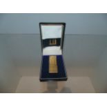 Gold plated Dunhill lighter in original box