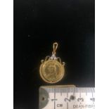 22ct Gold Fantasy jewellery queen Victoria coin with George and the dragon to rear set in a 9ct Gold