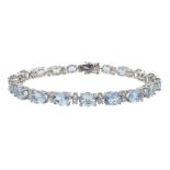 18ct white gold oval aquamarine and diamond bracelet