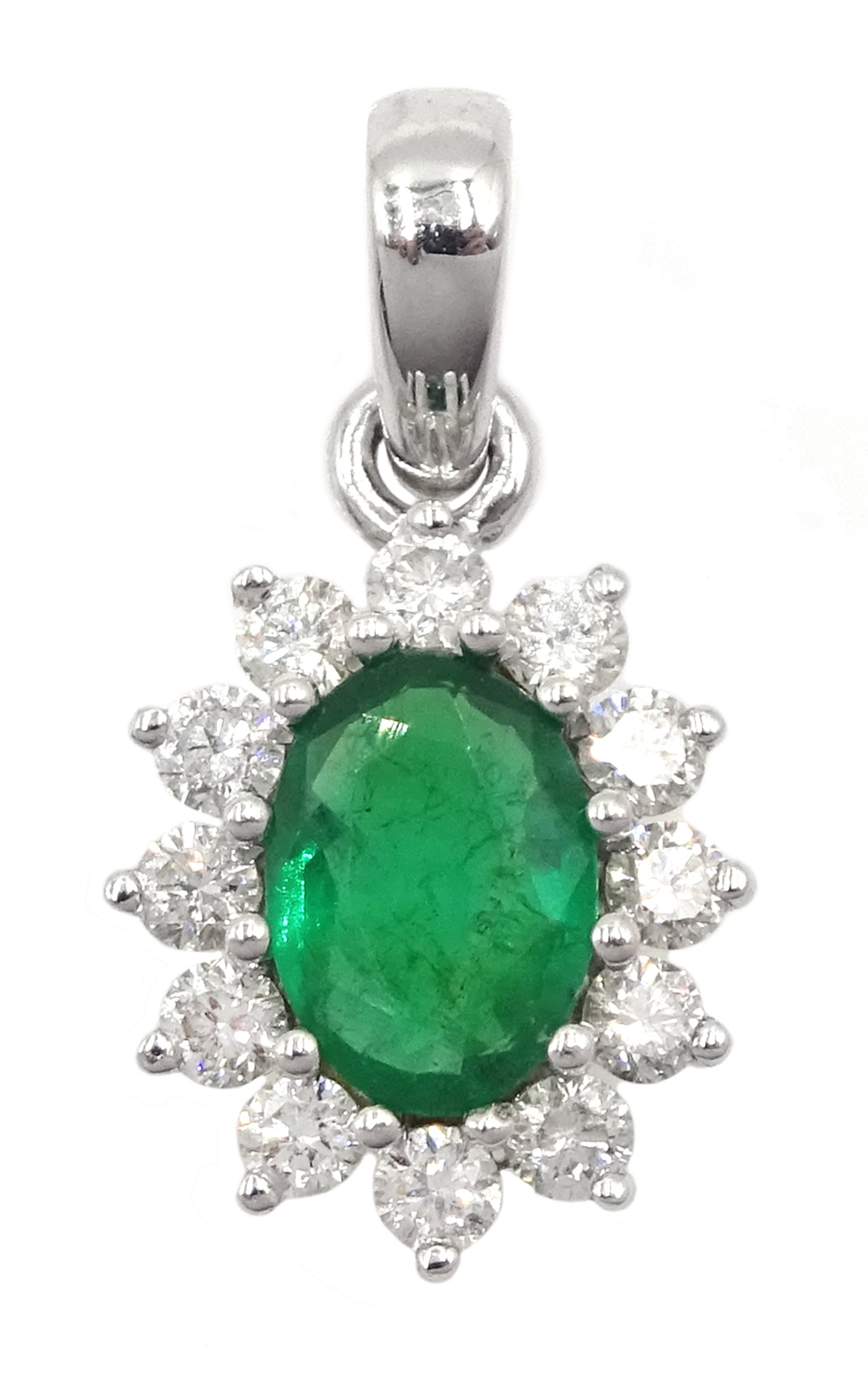 18ct white gold oval emerald and diamond cluster pendant