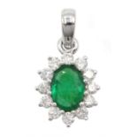18ct white gold oval emerald and diamond cluster pendant