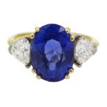 18ct gold oval Burmese sapphire and trillion cut diamond ring