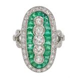 Platinum calibre cut emerald and round brilliant cut diamond oval panel ring