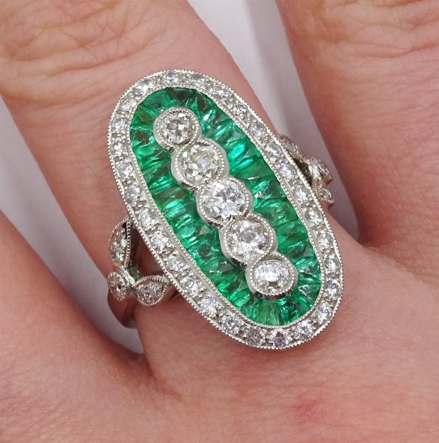 Platinum calibre cut emerald and round brilliant cut diamond oval panel ring - Image 2 of 6
