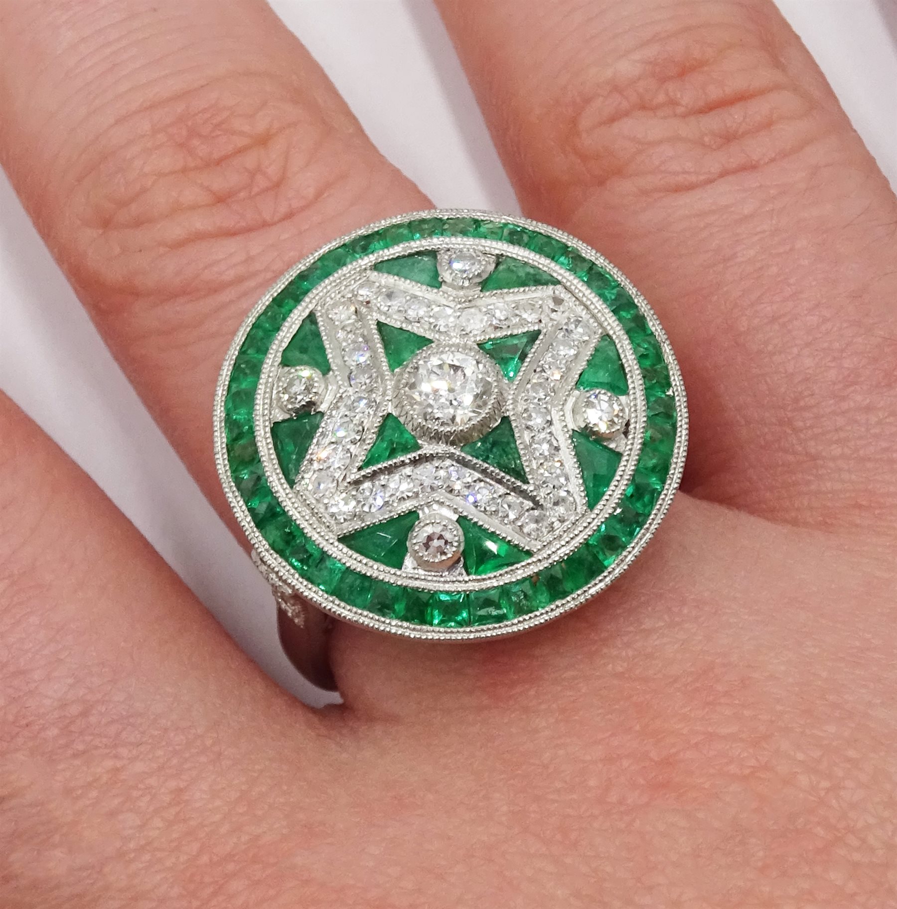 Platinum circular diamond and emerald, fancy design dress ring - Image 2 of 6