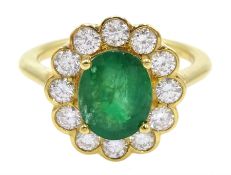 18ct gold oval emerald and diamond cluster ring