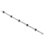 18ct white gold oval sapphire and round brilliant cut diamond link bracelet