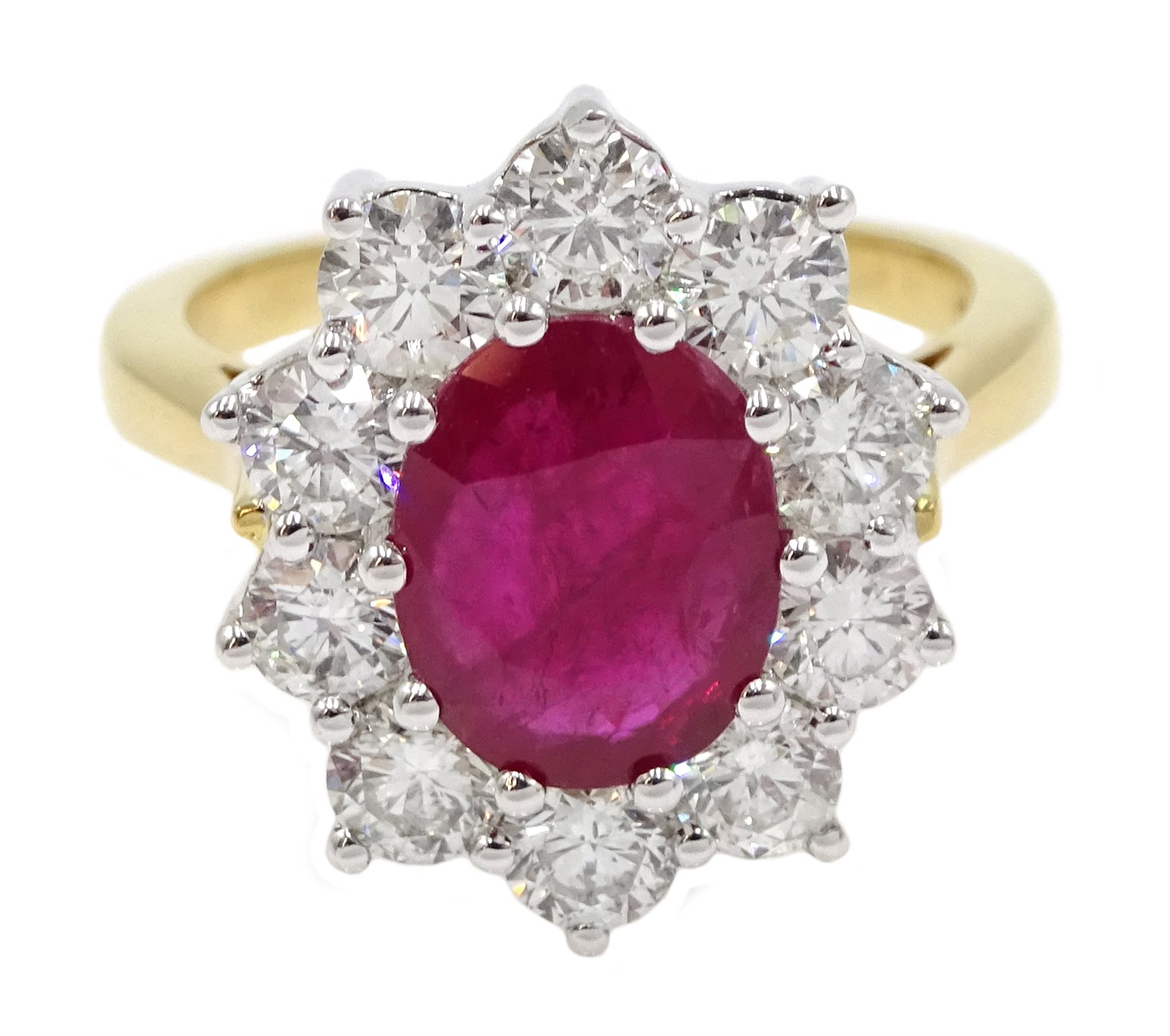 18ct gold oval ruby and round brilliant cut diamond cluster ring