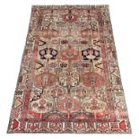 Persian Heriz red and pale ground rug