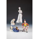 Clown, Fischer und Dame mit Hund