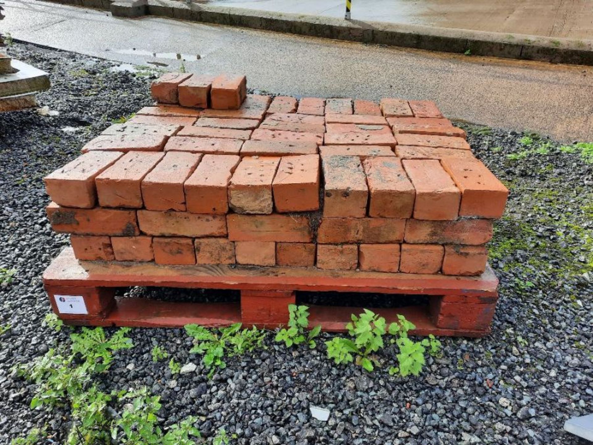 Pallet of red bricks