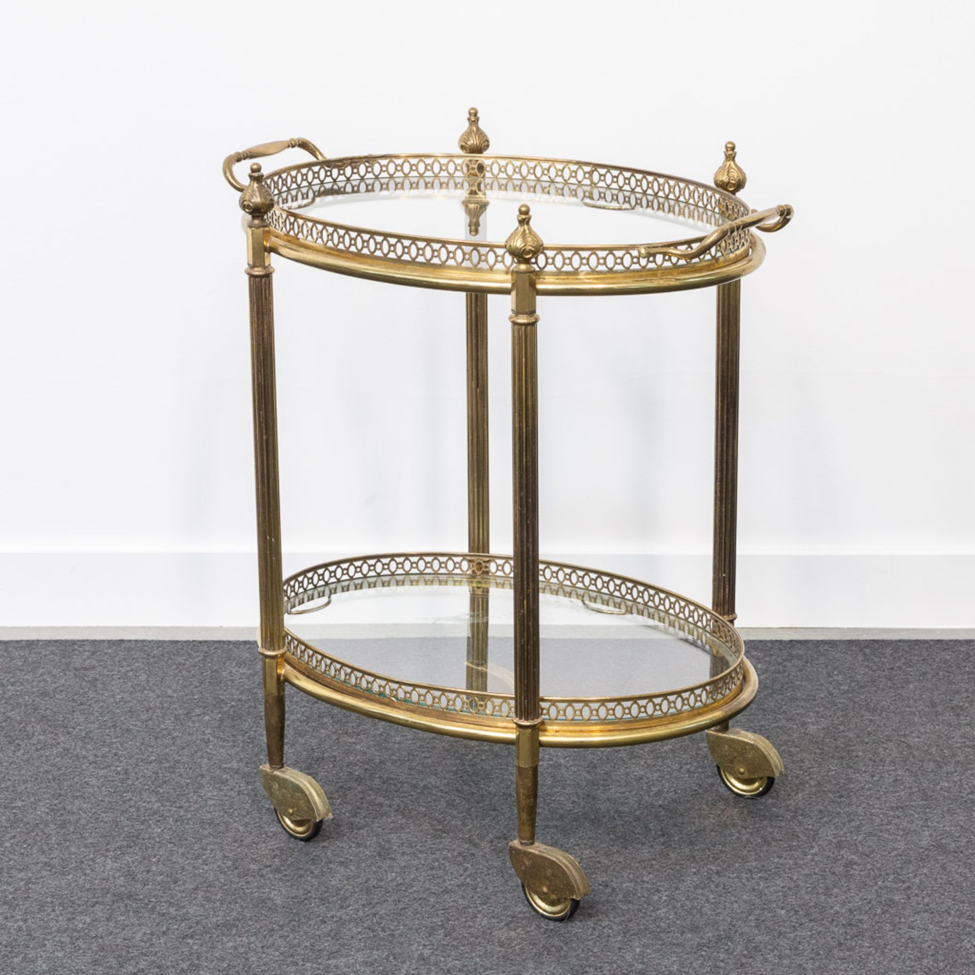 A metal and glass side table on wheels, in the style of Maison Jansen. - Image 10 of 20