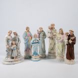 A collection of 7 bisque porcelain holy statues, Mary, Joseph, and Madonna.