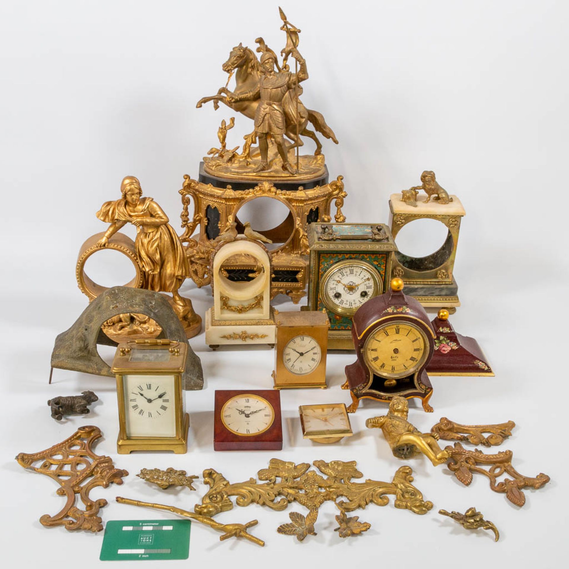 A collection of clocks and parts, a comptoise, an officers clock and table clock marked 'Jaeger Le C - Bild 11 aus 22